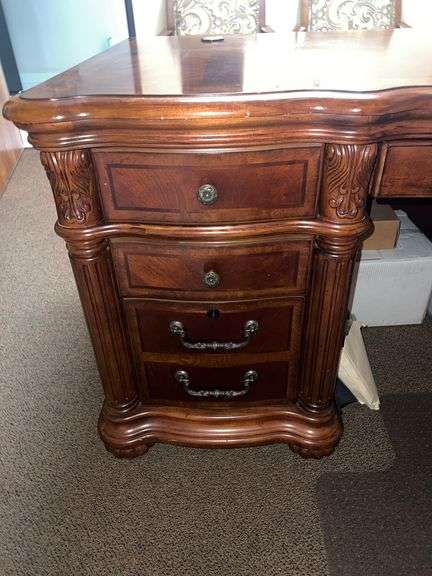 SOLID CHERRY WOOD EXECUTIVE DESK WITH BEAUTIFUL CARVED DESIGNS, 4-DRAWERS AND CABINET WITH PULL OUT SHELVES APROX 6'x3'x32" MATCHES LOT 30, 34 & 35