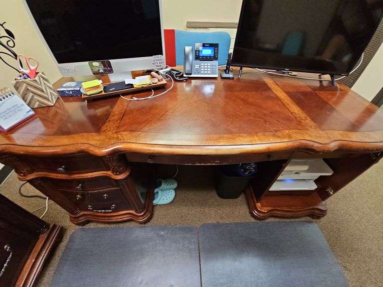 SOLID CHERRY WOOD EXECUTIVE DESK WITH BEAUTIFUL CARVED DESIGNS, 4-DRAWERS AND CABINET WITH PULL OUT SHELVES APROX 6'x3'x32" MATCHES LOT 29 , 30, & 35