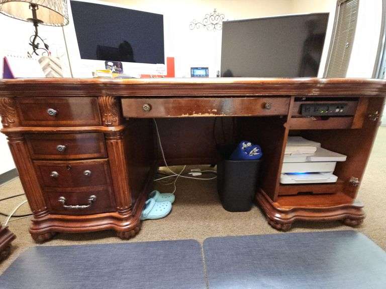 SOLID CHERRY WOOD EXECUTIVE DESK WITH BEAUTIFUL CARVED DESIGNS, 4-DRAWERS AND CABINET WITH PULL OUT SHELVES APROX 6'x3'x32" MATCHES LOT 29 , 30, & 35
