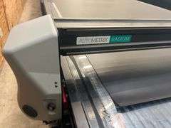 AUTOMETRIX ADVANTAGE SERIES RADIUM 60"W CNC Vinyl Cutting Table, 28-foot length with cutting length of 26'.. In perfect working almost NEW condition. Material holding rack included, however material is not. Bought last year with warranty still in place. This unit can be disassembled with plenty of help, tools, and time. Please plan accordingly.
