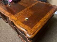 SOLID CHERRY WOOD EXECUTIVE DESK WITH BEAUTIFUL CARVED DESIGNS, 4-DRAWERS AND CABINET WITH PULL OUT SHELVES APROX 6'x3'x32" MATCHES LOT 30, 34 & 35