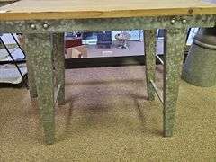 CONSOLE TABLE WITH SOLID WOOD TOP AND TIN METAL BASE APROX 32"x15.5"x30"