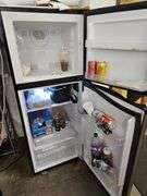 HAIER STAINLESS STEEL COMPACT REFRIGERATOR WITH FREEZER MODEL HA10TG21SS  59"x23"x25" IN GREAT WORKING CONDITION!!