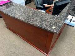 BEAUTIFUL CUSTOM GRANITE TOPPED SOLID CHERRY WOOD RECEPTIONIST DESK… APROX 6'x6.5'x3.5' **Important Buyer Notice.. Solid Granite top slab piece, cannot be disassembled without damaging unit, bring 4-wheel dollies and plenty of friends! Multiple bay doors that are dock height, as well as ramp