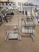 ROLLING METAL 4-TIER HANGER ORGANIZER WITH BRAKES, ADJUSTABLE HEIGHTS APROX 22"x15"x51"  **APROX 100 TOP AND BOTTOM BAMBOO HANGERS INCLD. IN LOT