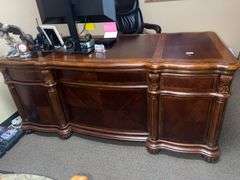 SOLID CHERRY WOOD EXECUTIVE DESK WITH BEAUTIFUL CARVED DESIGNS, 4-DRAWERS AND CABINET WITH PULL OUT SHELVES APROX 6'x3'x32" MATCHES LOT 30, 34 & 35