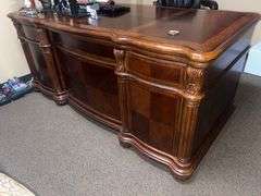 SOLID CHERRY WOOD EXECUTIVE DESK WITH BEAUTIFUL CARVED DESIGNS, 4-DRAWERS AND CABINET WITH PULL OUT SHELVES APROX 6'x3'x32" MATCHES LOT 30, 34 & 35