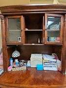 SOLID CHERRY WOOD ARMOIRE WITH BEAUTIFUL CARVED DESIGNS, 2-DRAWERS, BOTTOM CABINET WITH PULL OUT SHELVES APROX 4'x2'x7' MATCHES LOT 29 , 30, & 35