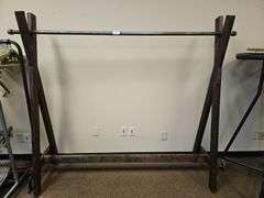 CUSTOM FABRICATED RUSTIC CLOTHING RACK WITH SOLID WOOD STANDS AND METAL PIPE HANGER TOTAL SIZE APROX 6'x21"x68"