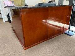 BEAUTIFUL CUSTOM GRANITE TOPPED SOLID CHERRY WOOD RECEPTIONIST DESK… APROX 6'x6.5'x3.5' **Important Buyer Notice.. Solid Granite top slab piece, cannot be disassembled without damaging unit, bring 4-wheel dollies and plenty of friends! Multiple bay doors that are dock height, as well as ramp