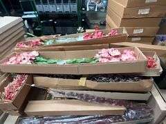 LARGE LOT OF A WIDE VARIETY OF AMERICAN BEST ARTIFICIAL SILK FLOWERS INCLUDING SWAG, VINES, FOLIAGE, FLOWERS ECT  ALL NEW IN CASE, HUNDREDS OF PCS IN LOT