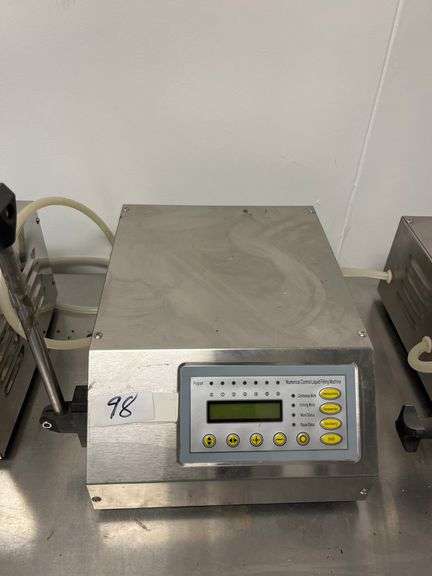 GFK-160 numerical control liquid filling machine, two operation modes: automatic or foot-pedal controlled, 2ml to 3500ml,