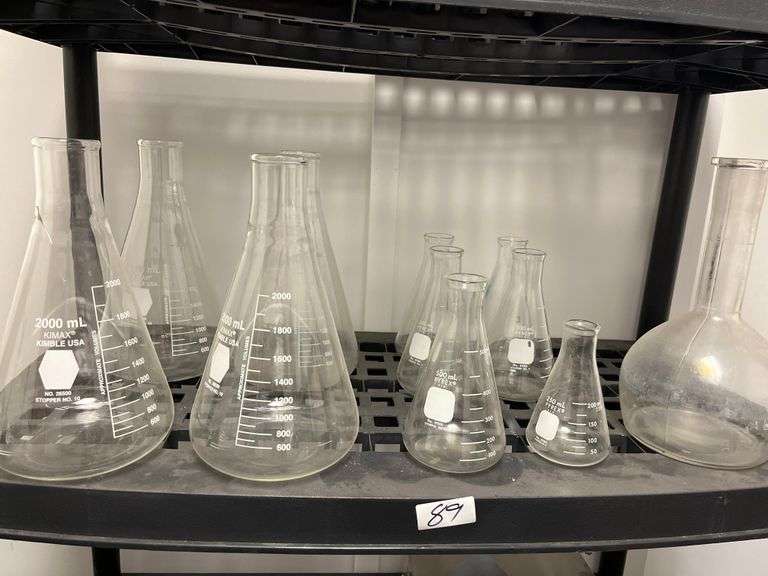 Lot of assorted KIMAX and PYREX brand Erlenmeyer borosilicate flasks ranging from 250mL to 2000mL Count 11