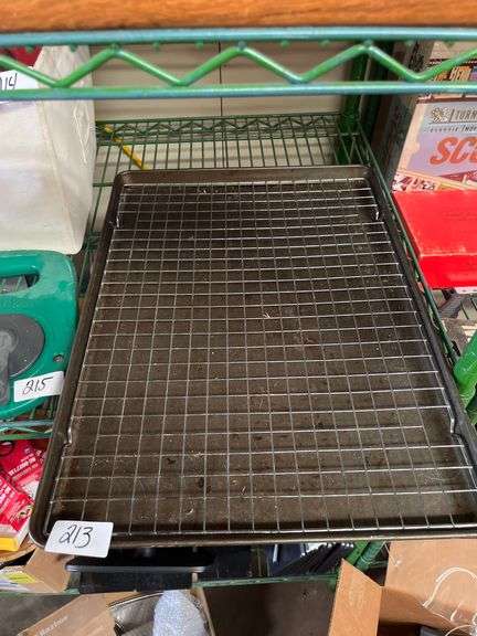 Stainless steel roasting and cooling rack paired with a baking pan