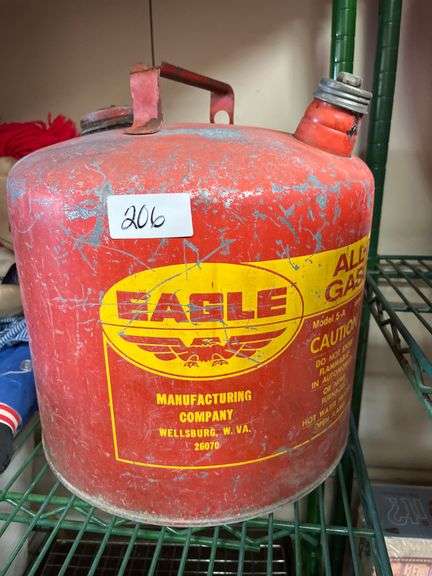 intage Eagle Manufacturing Company 5-gallon galvanized steel safety gas can.