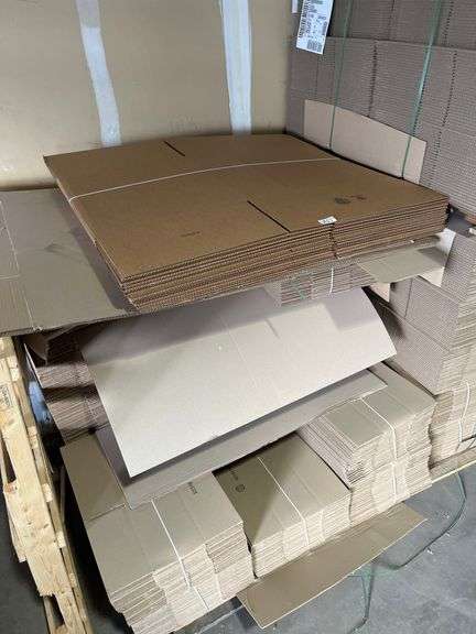 Assorted cardboard shipping boxes, manufactured for packing, storage, and mailing.