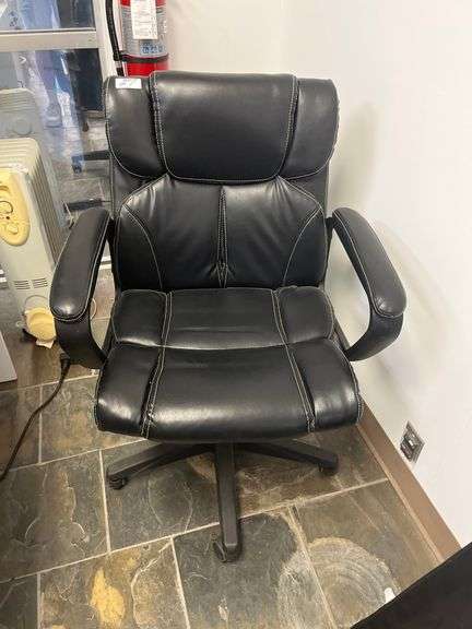 Leather High-Back Chair features prominent white stitching