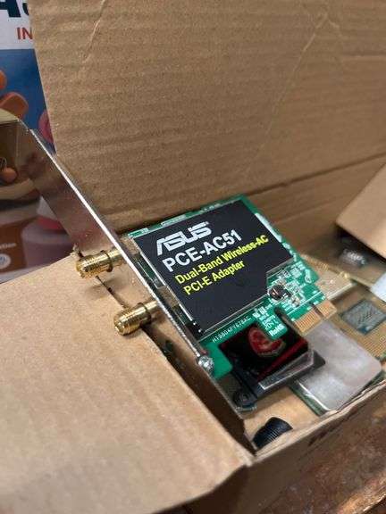 Collection of computer processors and a PCIe Wi-Fi adapter, ASUS PCE-AC51 is a dual-band wireless-AC adapter