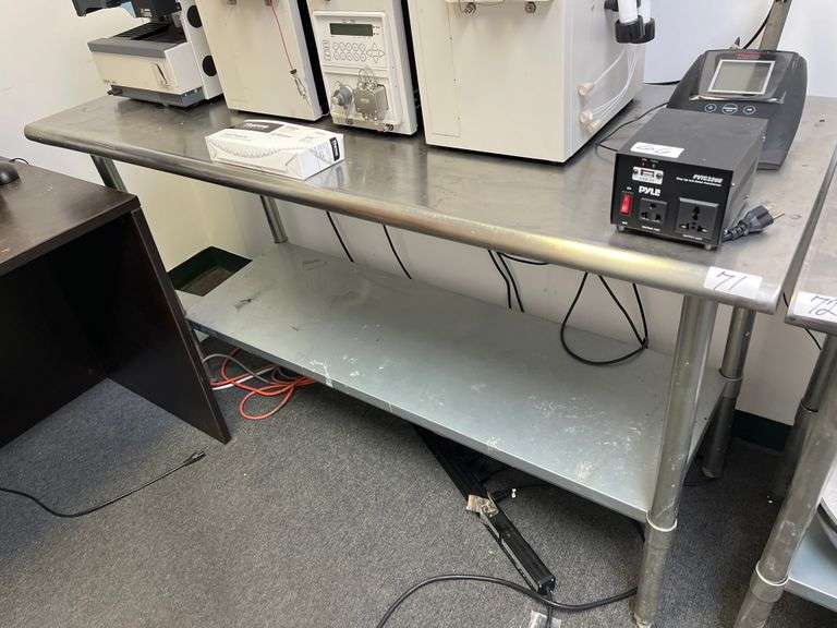 Commercial NSF certified stainless steel work table features an adjustable undershelf