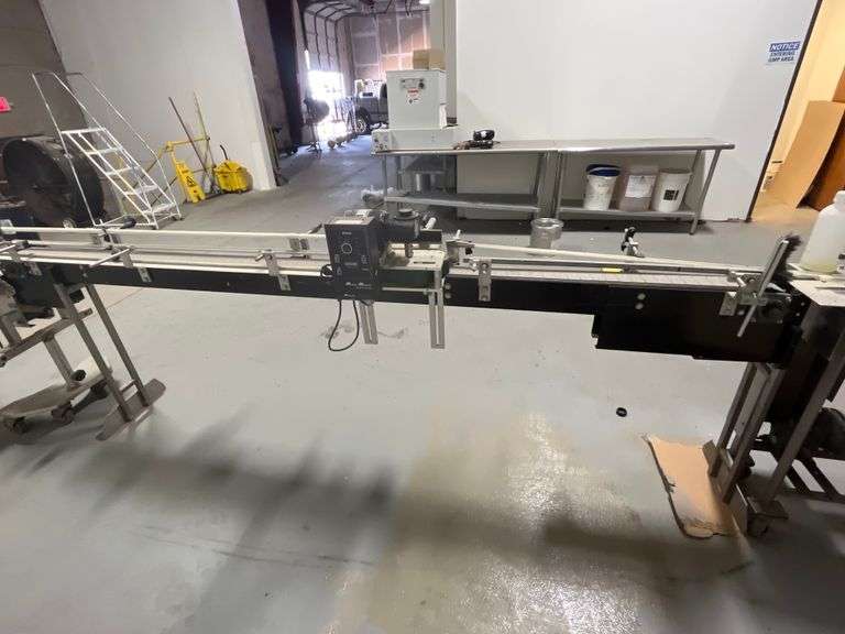 Industrial conveyor bottle labeling machine w/ Minarik Motor Master 20000 Series speed controller retails $2k