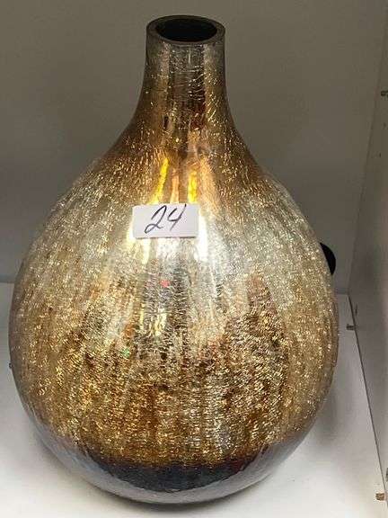 Glass ombre vase featuring a blown, teardrop shape with a textured gold and silver base
