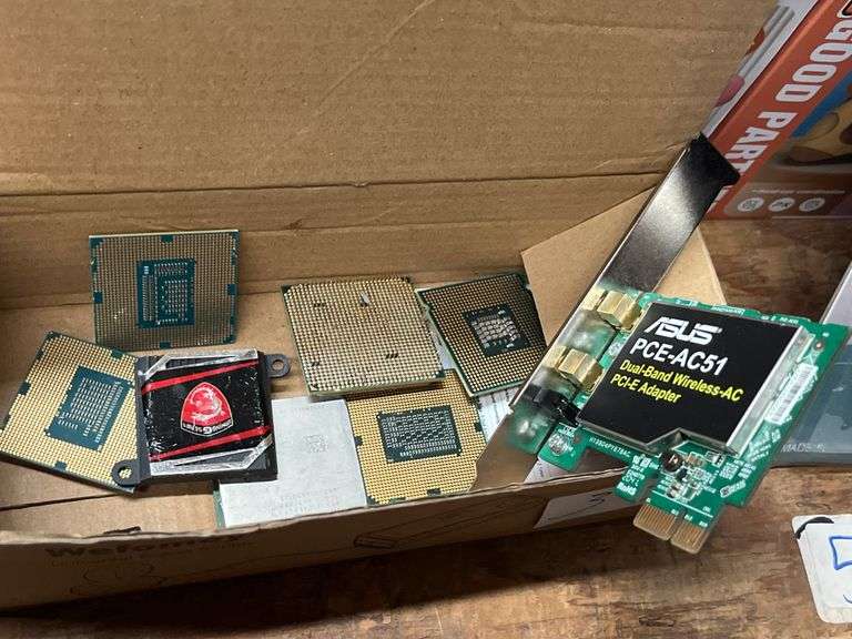 Collection of computer processors and a PCIe Wi-Fi adapter, ASUS PCE-AC51 is a dual-band wireless-AC adapter