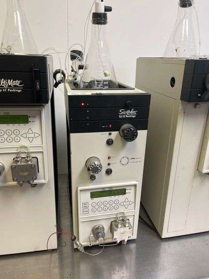 LC Packings Switchos II micro column switching unit ft. two Valco 10-port low-dispersion switching valves, automatic or manual control