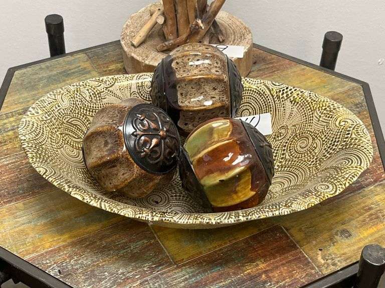 Decorative set features a patterned oval bowl paired with three textured orbs, similar to styles offered by brands like Hosley.