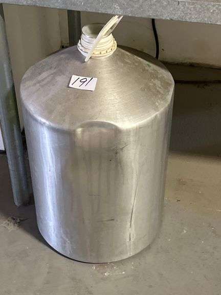 large aluminum container, used for storing industrial liquids, essential oils, or chemicals.