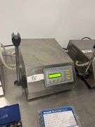 GFK-160 numerical control liquid filling machine, two operation modes: automatic or foot-pedal controlled, 2ml to 3500ml,