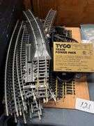vintage Tyco HO scale model train set featuring brass track, a power pack, and operating instructions. Tyco model 899T