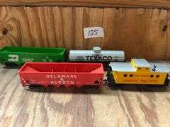 lot includes HO Scale models incld. the Delaware & Hudson hopper car and a Union Pacific caboose.