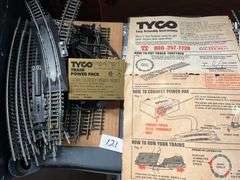 vintage Tyco HO scale model train set featuring brass track, a power pack, and operating instructions. Tyco model 899T
