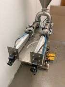 JORESTECH brand dual-head high-viscosity paste piston filling machine, model E-FP-1000-D2. Priced for $10K