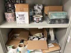 Shelf lot containing DLK Medical Solutions hand sanitizer wipes, rolls of shipping labels