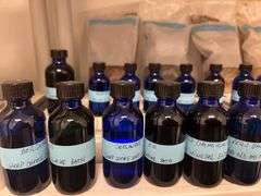 dried herbs, flowers, essential oils, and ingredients