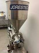 JORESTECH brand dual-head high-viscosity paste piston filling machine, model E-FP-1000-D2. Priced for $10K