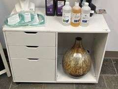 White mobile file cabinet features three storage drawers and an open shelf