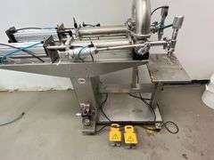 JORESTECH brand dual-head high-viscosity paste piston filling machine, model E-FP-1000-D2. Priced for $10K