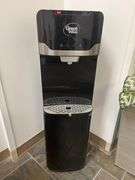 Bottom Loading Hot/Cold/Room Temperature Water Dispenser in a black and stainless steel finish