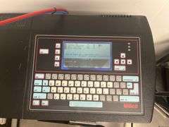 Willett industrial inkjet printer model 460si, built in qwerty keyboard w/ screen.