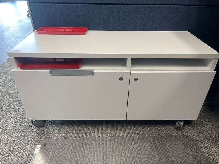 WHITE LOW CABINET WITH SINGLE DRAWER, ON WHEELS W/ BRAKES APROX 42"x16"x21"