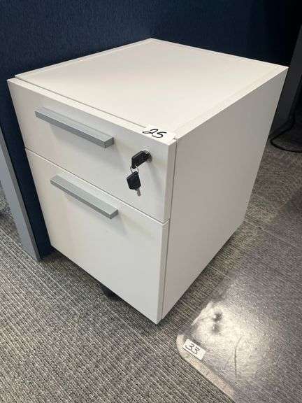 WHITE LOCKING LOW FILE CABINET WITH 2-DRAWERS, ON WHEELS W/ BRAKES, & KEYS INCLUDED APROX 16"x18"x21.5"