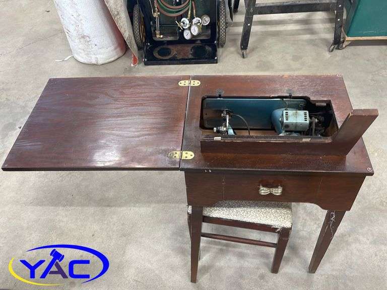 Antique Imperial Sewing Machine and Bench - YAC Auctions