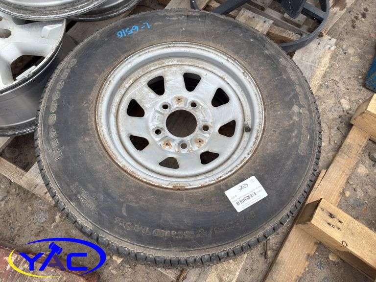 P235/75R15 Firestone Tire On 15