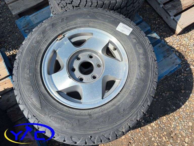 4- 245/75R16 Tires & Rims (Rims Only. Tires Cracked)