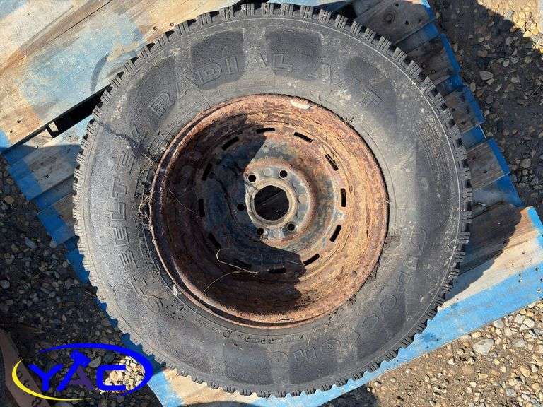 2- 245/75R16 Tires & Rims From A Trailer. (Rims Only. Tires Worn And Cracked)