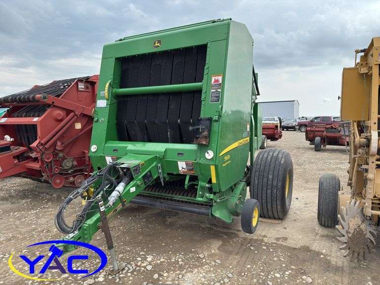 2015 JOHN DEERE 569 ROUND BALER