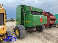 2015 JOHN DEERE 569 ROUND BALER