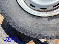 2- 245/75R16 Tires & Rims From A Trailer. (Rims Only. Tires Worn And Cracked)